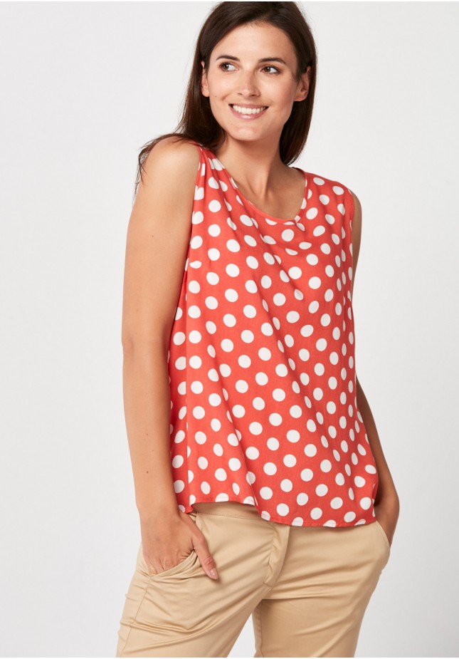 Airy orange blouse with dots