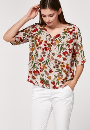 Blouse with red flowers