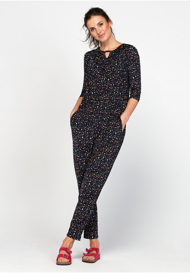 Navy blue jumpsuit with colorful figures