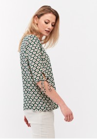 Blouse with tied sleeves