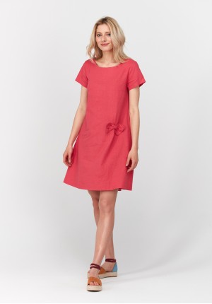 Pink linen dress with a bow