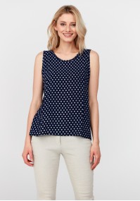 Top with polka dots pattern