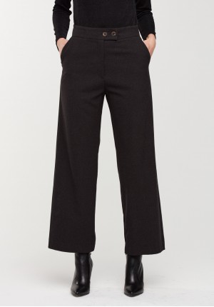 Dark grey trousers with a loose cut