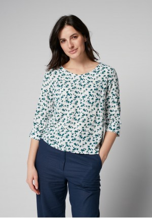 White blouse with green pattern