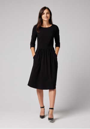 Elegant tapered waist black dress