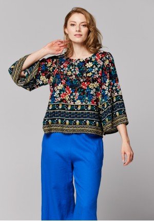 Blouse with wide sleeves