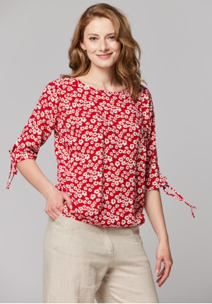 Red blouse with tied sleeves