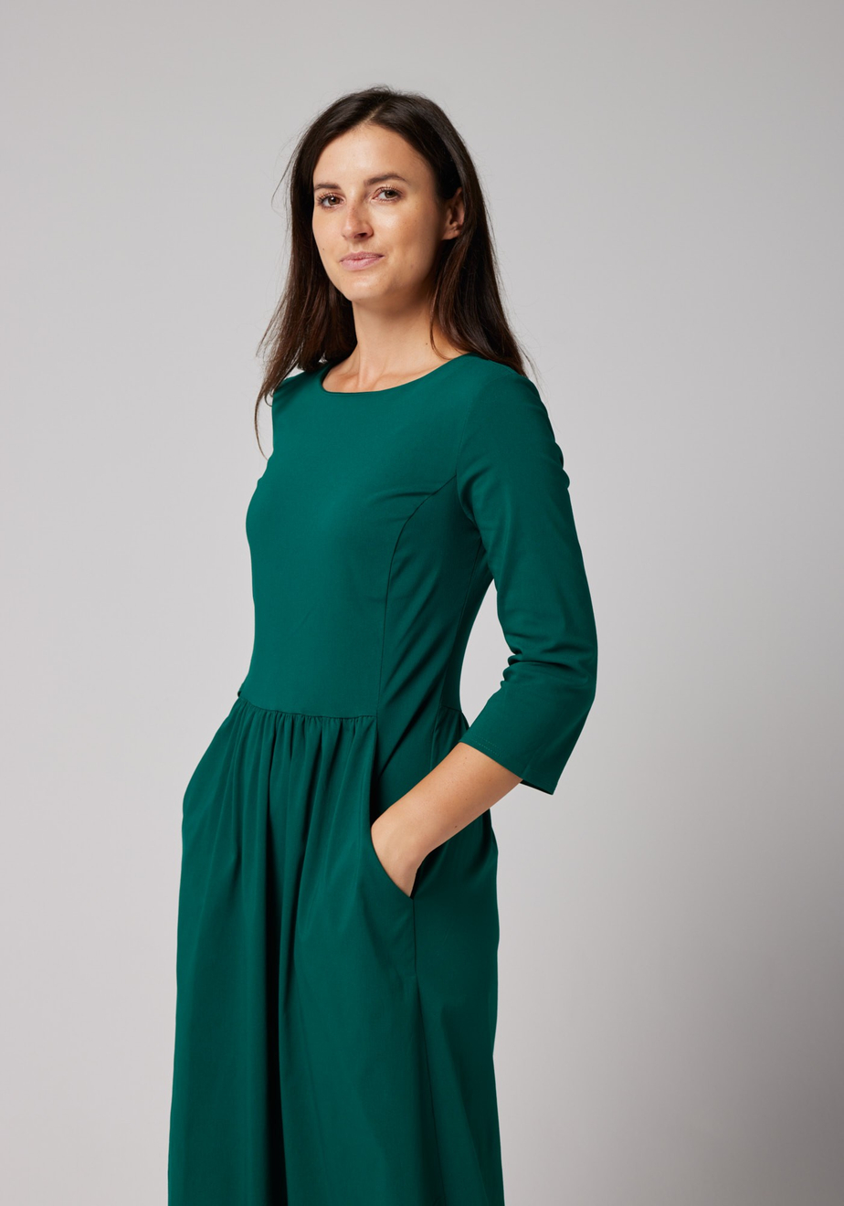 Elegancka ciemnozielona sukienka midi 1782