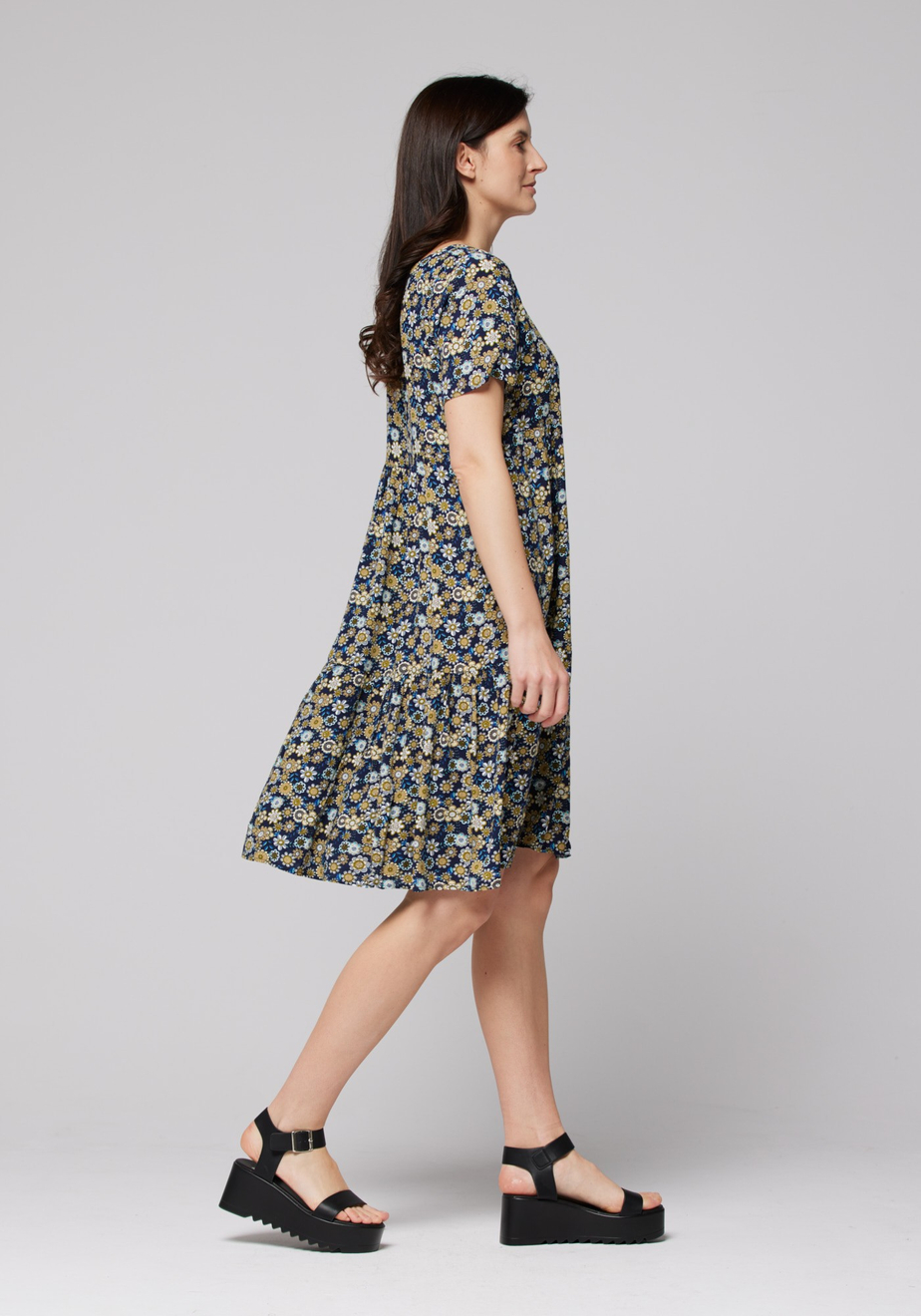 Trapezowa sukienka w rozetki 1016